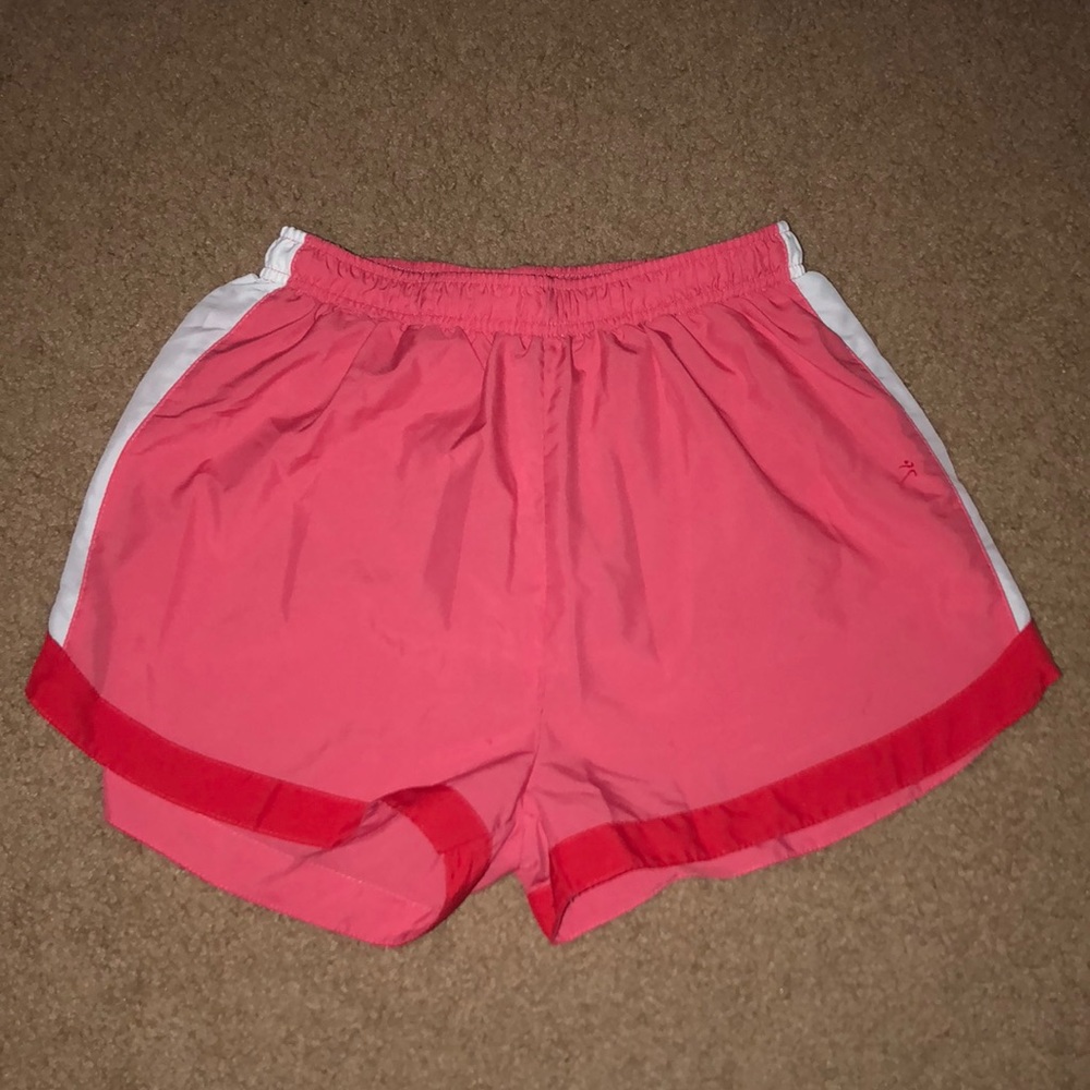 Coral colored running shorts